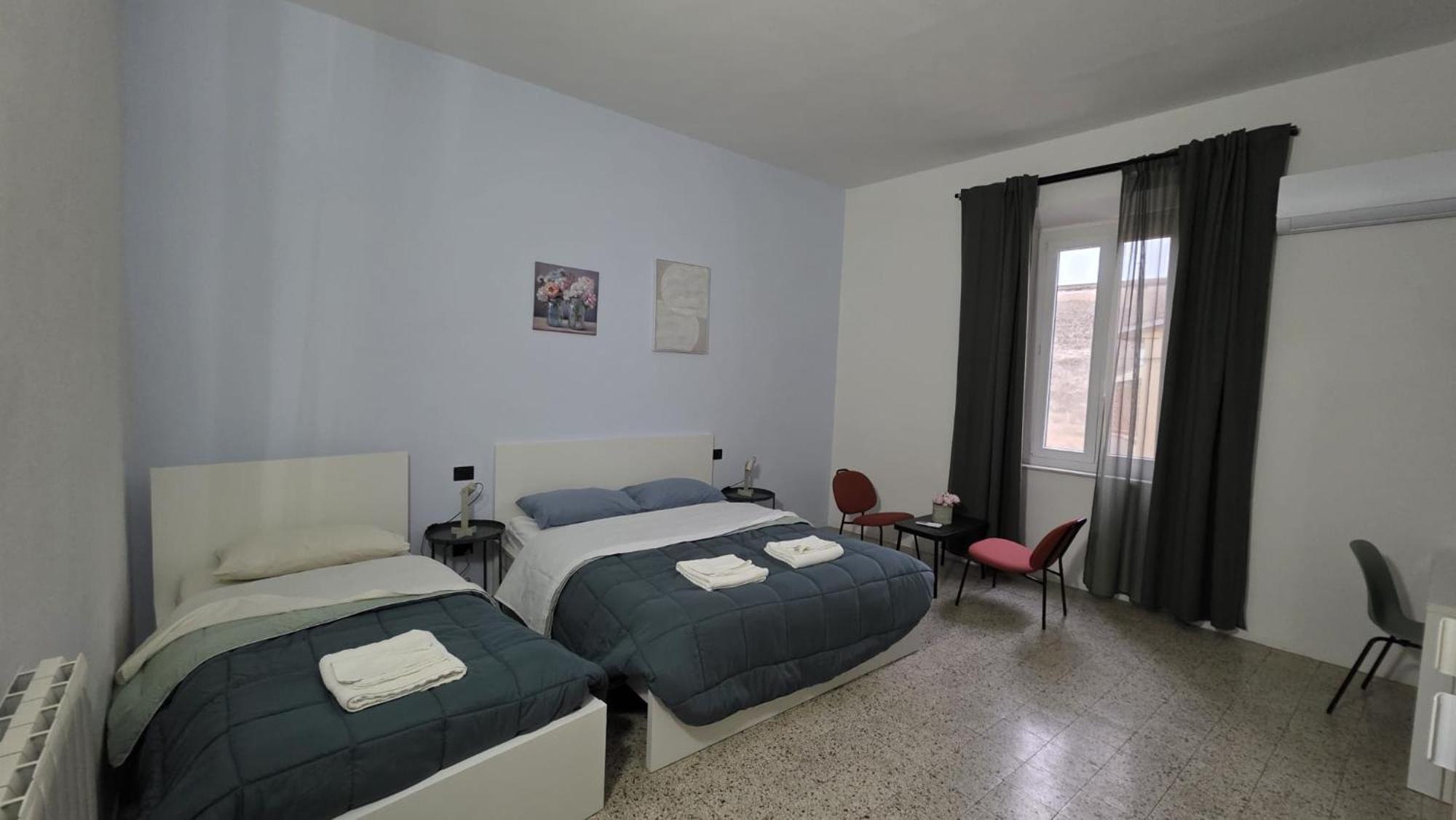 Camera Tripla Basic con Bagno in Comune