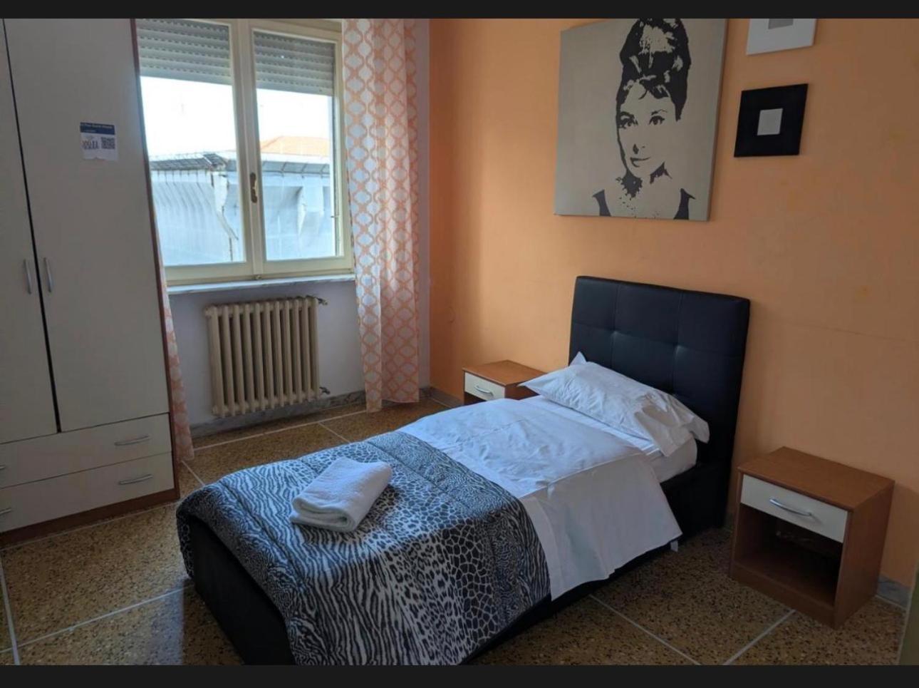 Camera Singola con Bagno in Comune